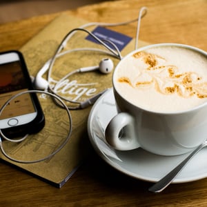 Coffee and iphone on the table 