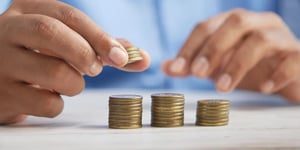 booster-blog-making-extra-kiwisaver-contributions-stacking-coins-new-zealand