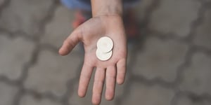 booster-blog-money-talk-kids-challenge-coins-in-hand-new-zealand